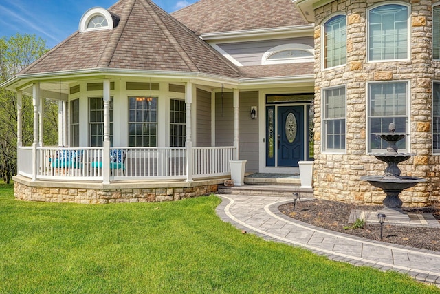 2051 River Rd, Delaware, OH 43015 - view of front of property featuring covered porch, a front yard, stone siding, and a shingled roof