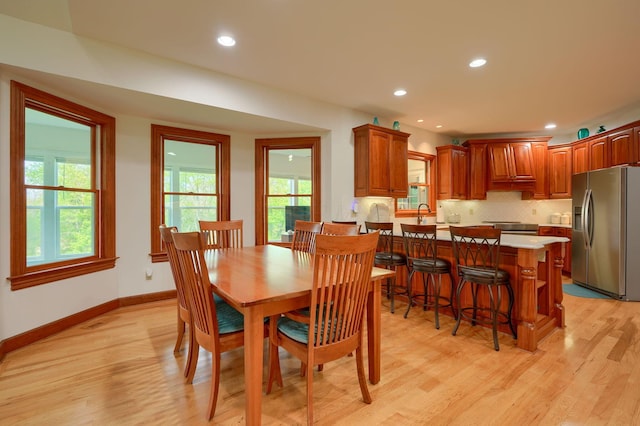 2051 River Rd, Delaware, OH 43015 - dining room with light wood-style floors, baseboards, and recessed lighting