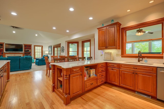 2051 River Rd, Delaware, OH 43015 - kitchen with light countertops, a sink, light wood-style floors, and recessed lighting