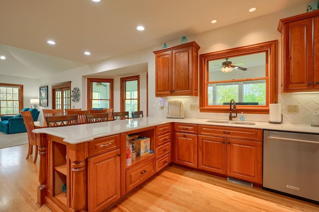 2051 River Rd, Delaware, OH 43015 - kitchen featuring dishwasher, a sink, light wood-style floors, light countertops, and recessed lighting