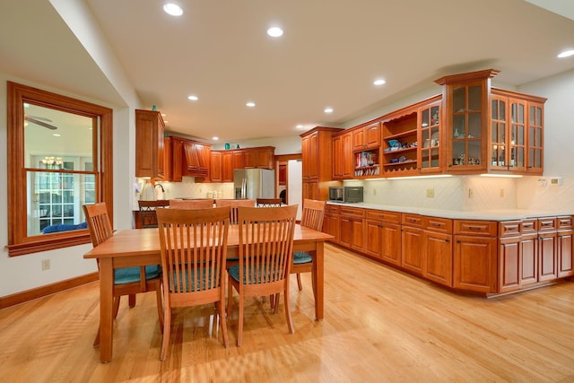 2051 River Rd, Delaware, OH 43015 - dining space featuring recessed lighting, light wood-style floors, and baseboards