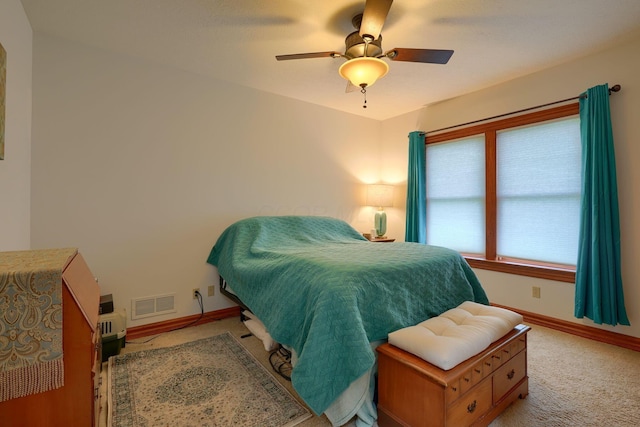 2051 River Rd, Delaware, OH 43015 - bedroom featuring baseboards, light carpet, and a ceiling fan