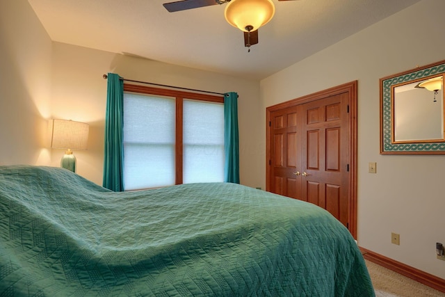 2051 River Rd, Delaware, OH 43015 - bedroom with baseboards, carpet flooring, a closet, and ceiling fan