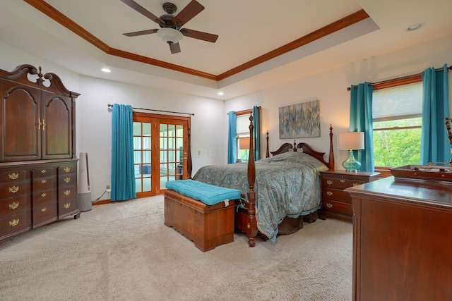 2051 River Rd, Delaware, OH 43015 - bedroom with a tray ceiling, multiple windows, french doors, light colored carpet, and ornamental molding