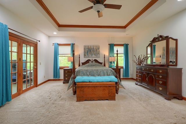 2051 River Rd, Delaware, OH 43015 - carpeted bedroom featuring a tray ceiling, crown molding, baseboards, multiple windows, and recessed lighting