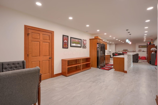2051 River Rd, Delaware, OH 43015 - kitchen featuring open floor plan, fridge with ice dispenser, recessed lighting, a center island, and pendant lighting