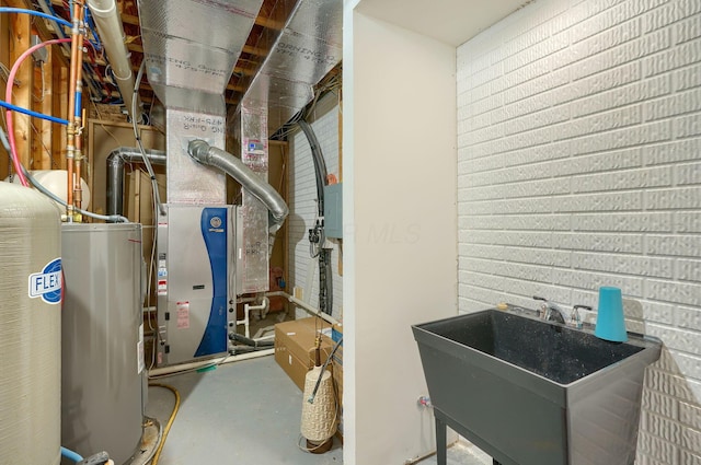 2051 River Rd, Delaware, OH 43015 - utilities with a sink and electric water heater