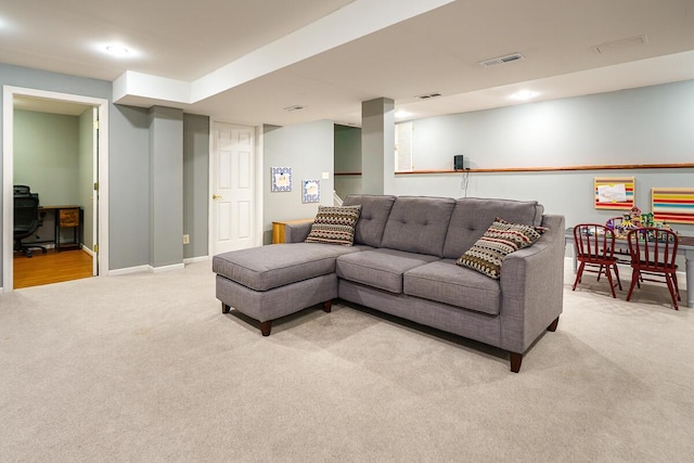 living area with light colored carpet, recessed lighting, baseboards, and visible vents
