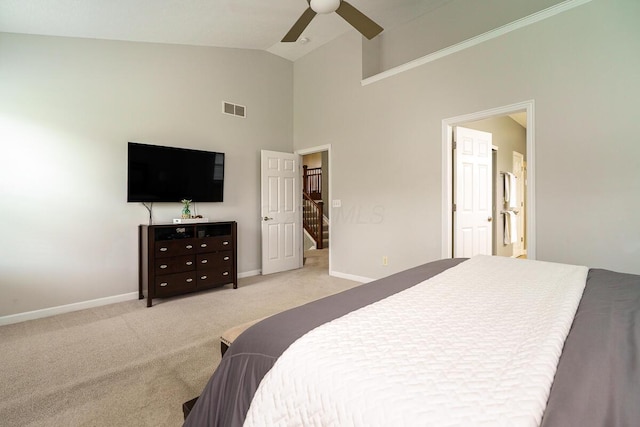 bedroom with a ceiling fan, visible vents, high vaulted ceiling, baseboards, and light carpet