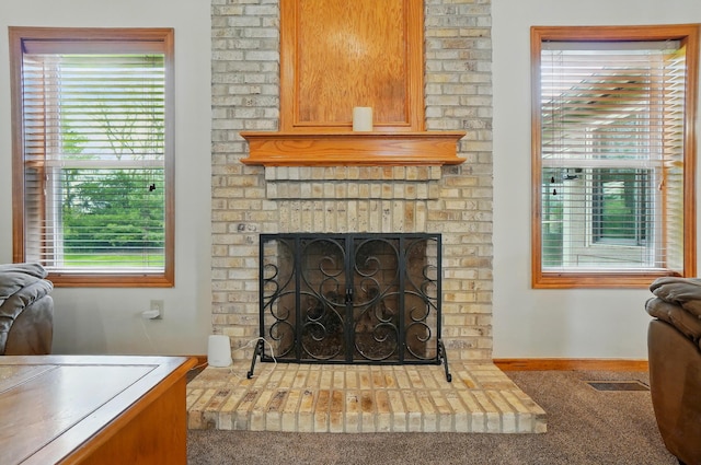 1775 Harrison Pond Dr, New Albany, OH 43054 - living room featuring a brick fireplace, carpet flooring, healthy amount of natural light, and baseboards