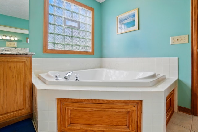 1775 Harrison Pond Dr, New Albany, OH 43054 - full bathroom with tile patterned floors, a bath, and vanity