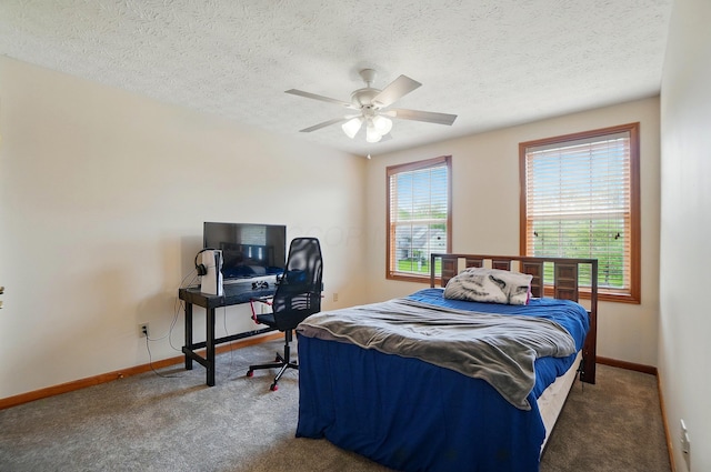 1775 Harrison Pond Dr, New Albany, OH 43054 - bedroom featuring carpet flooring, baseboards, a textured ceiling, and a ceiling fan