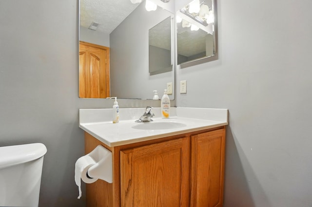 1775 Harrison Pond Dr, New Albany, OH 43054 - bathroom with toilet and vanity