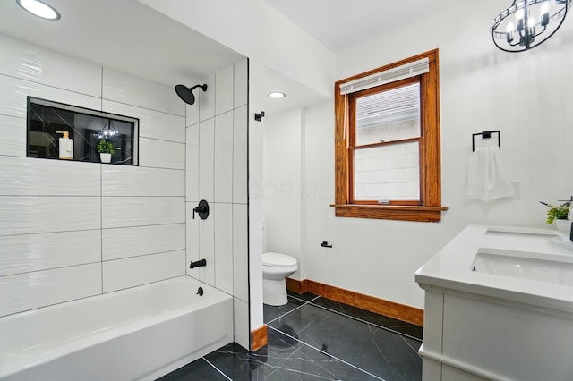 bathroom featuring double vanity, toilet, baseboards, bathtub / shower combination, and recessed lighting