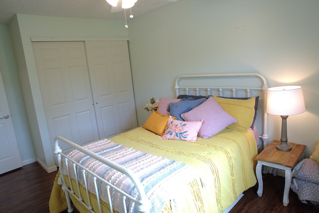 bedroom featuring a closet and wood finished floors