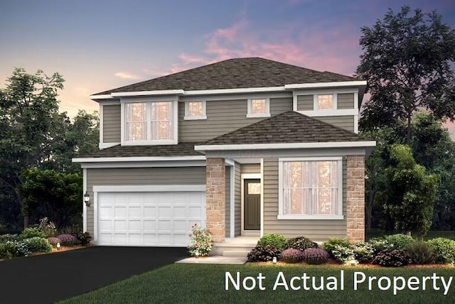 view of front facade featuring driveway, a shingled roof, stone siding, and a garage
