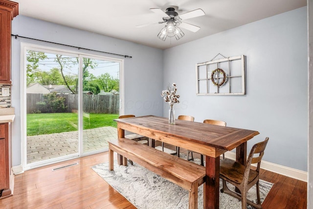 5392 Grandon Dr, Hilliard, OH 43026 - dining space featuring baseboards, light wood finished floors, and ceiling fan