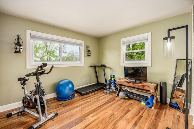 5392 Grandon Dr, Hilliard, OH 43026 - workout area featuring wood finished floors and baseboards