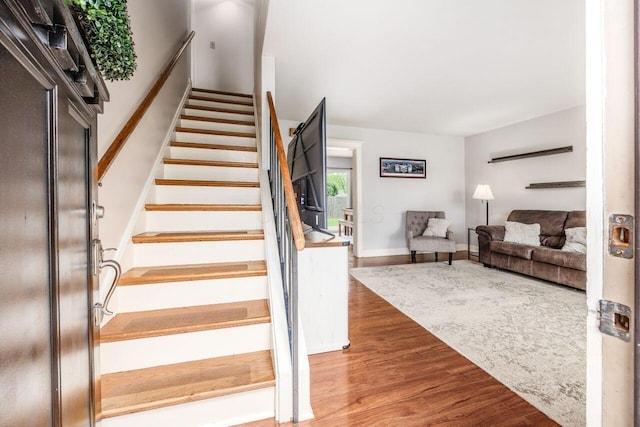 5392 Grandon Dr, Hilliard, OH 43026 - stairway featuring wood finished floors and baseboards