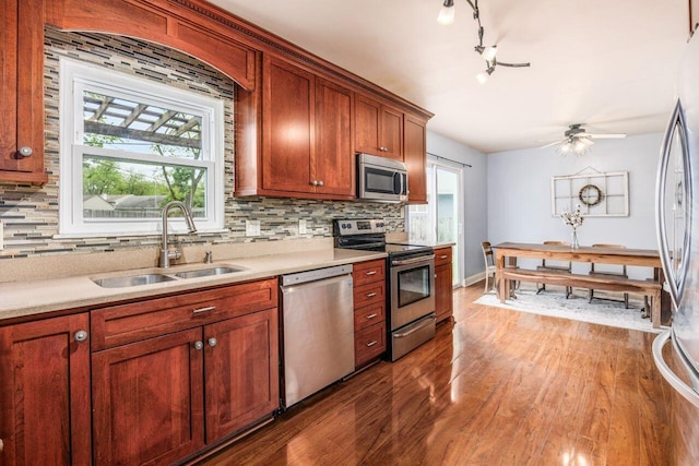 5392 Grandon Dr, Hilliard, OH 43026 - kitchen with stainless steel appliances, a sink, wood finished floors, and light countertops