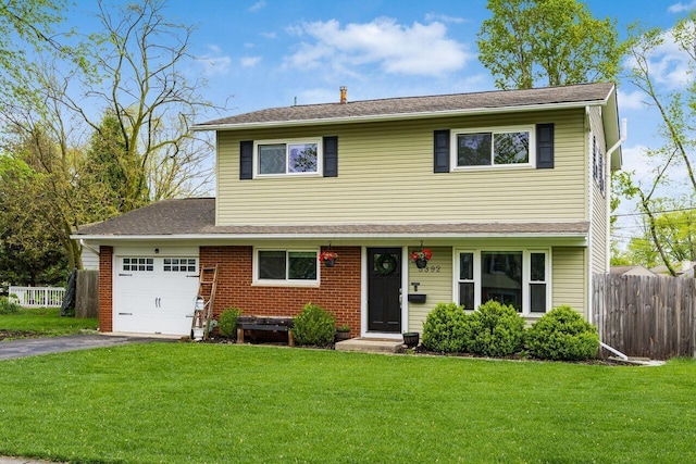 5392 Grandon Dr, Hilliard, OH 43026 - traditional-style home with a garage, asphalt driveway, and entry steps