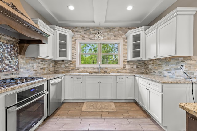 39403 State Route 689, Albany, OH 45710 - kitchen featuring stainless steel appliances, a sink, white cabinets, wall chimney exhaust hood, and recessed lighting