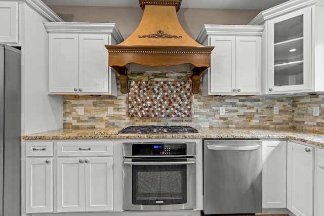 39403 State Route 689, Albany, OH 45710 - kitchen featuring appliances with stainless steel finishes, custom range hood, and white cabinets