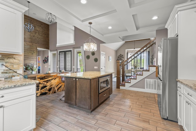 39403 State Route 689, Albany, OH 45710 - kitchen featuring stainless steel appliances, plenty of natural light, white cabinetry, recessed lighting, and coffered ceiling