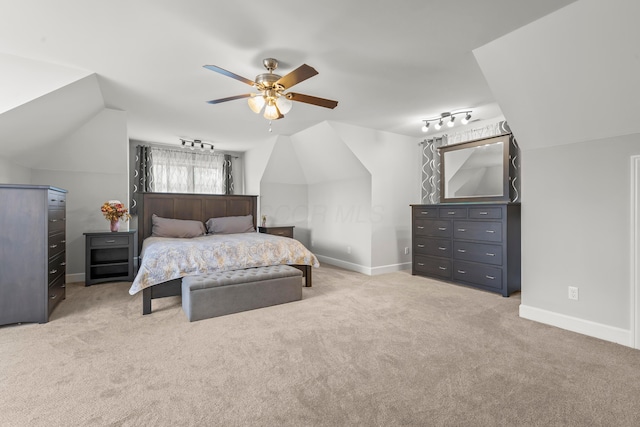 39403 State Route 689, Albany, OH 45710 - bedroom featuring baseboards, light colored carpet, lofted ceiling, and a ceiling fan
