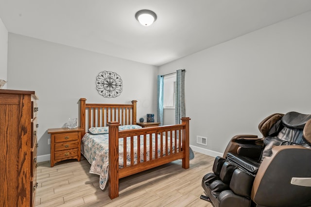 39403 State Route 689, Albany, OH 45710 - bedroom featuring light wood-style flooring and baseboards