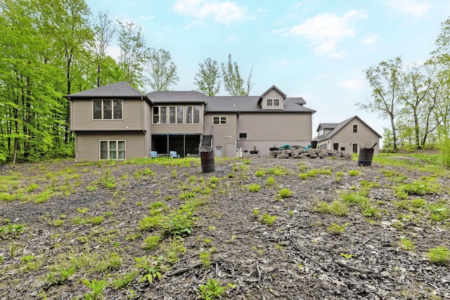 39403 State Route 689, Albany, OH 45710 - rear view of house featuring a sunroom