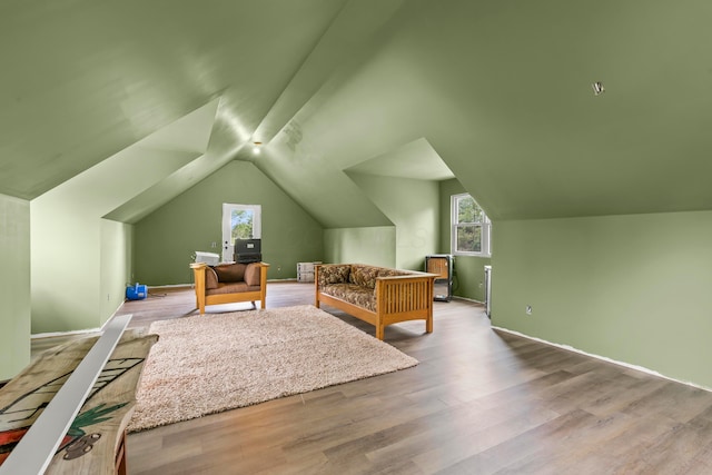 39403 State Route 689, Albany, OH 45710 - bedroom featuring wood finished floors, vaulted ceiling, and baseboards