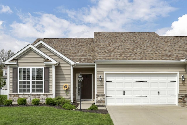 149 Broadmoore Blvd, Pataskala, OH 43062 - view of front of house featuring roof with shingles, an attached garage, driveway, and stone siding