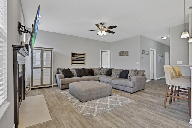 149 Broadmoore Blvd, Pataskala, OH 43062 - living area with baseboards, a ceiling fan, and wood finished floors