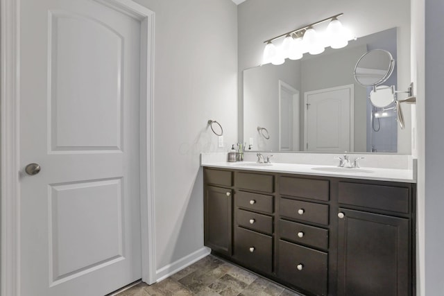 149 Broadmoore Blvd, Pataskala, OH 43062 - full bath featuring a sink, baseboards, and double vanity