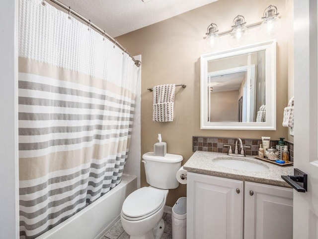 full bath with toilet, shower / tub combo with curtain, and vanity