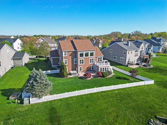 birds eye view of property with a residential view