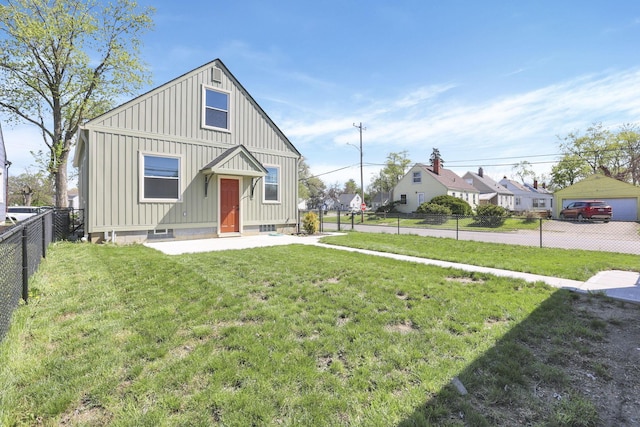 bungalow featuring fence, a patio, board and batten siding, and a front lawn