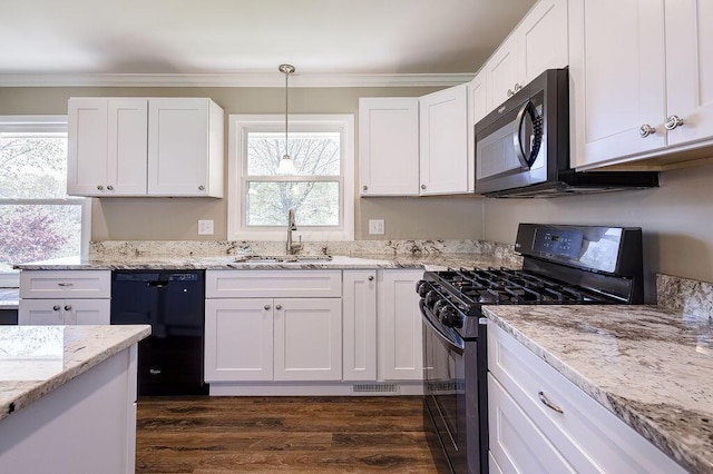 kitchen with gas stove, a sink, dishwasher, white cabinetry, and dark wood-style floors