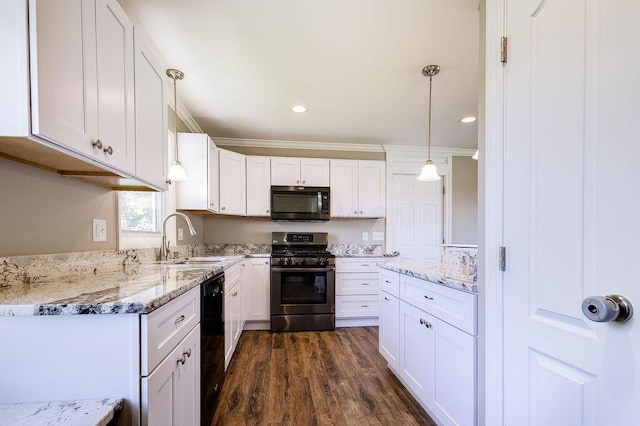 kitchen featuring stainless steel range with gas cooktop, a sink, black dishwasher, and white cabinets