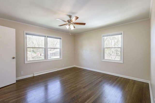 spare room with ornamental molding, ceiling fan, a baseboard heating unit, and dark wood-style floors