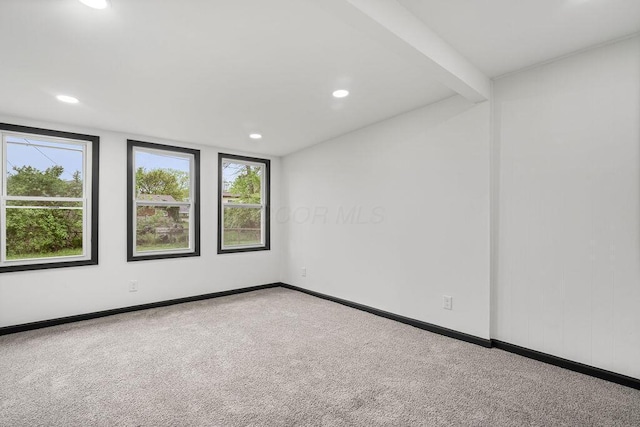 1727 Niagara Rd, Columbus, OH 43227 - unfurnished room with plenty of natural light, carpet, recessed lighting, baseboards, and beam ceiling