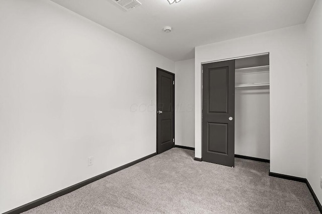 1727 Niagara Rd, Columbus, OH 43227 - unfurnished bedroom featuring carpet floors, baseboards, and a closet