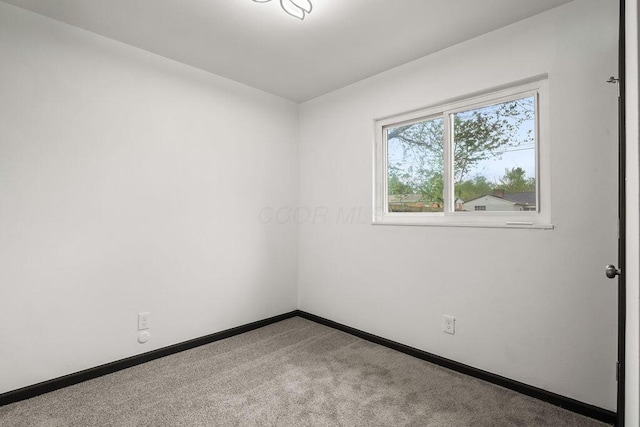 1727 Niagara Rd, Columbus, OH 43227 - empty room with baseboards and carpet flooring