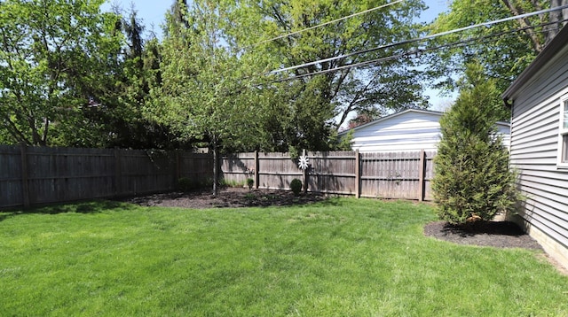 view of yard featuring a fenced backyard