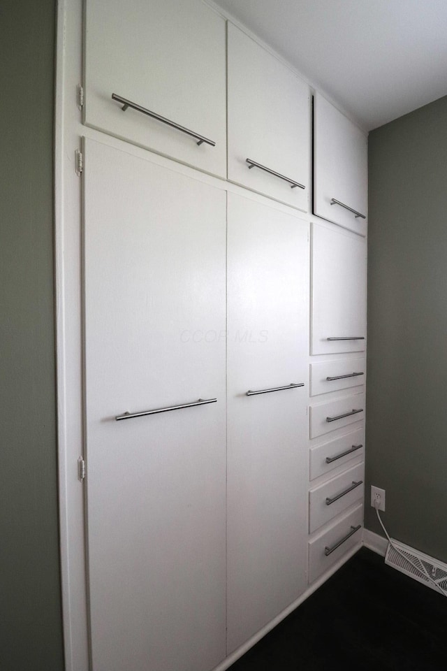 closet featuring visible vents