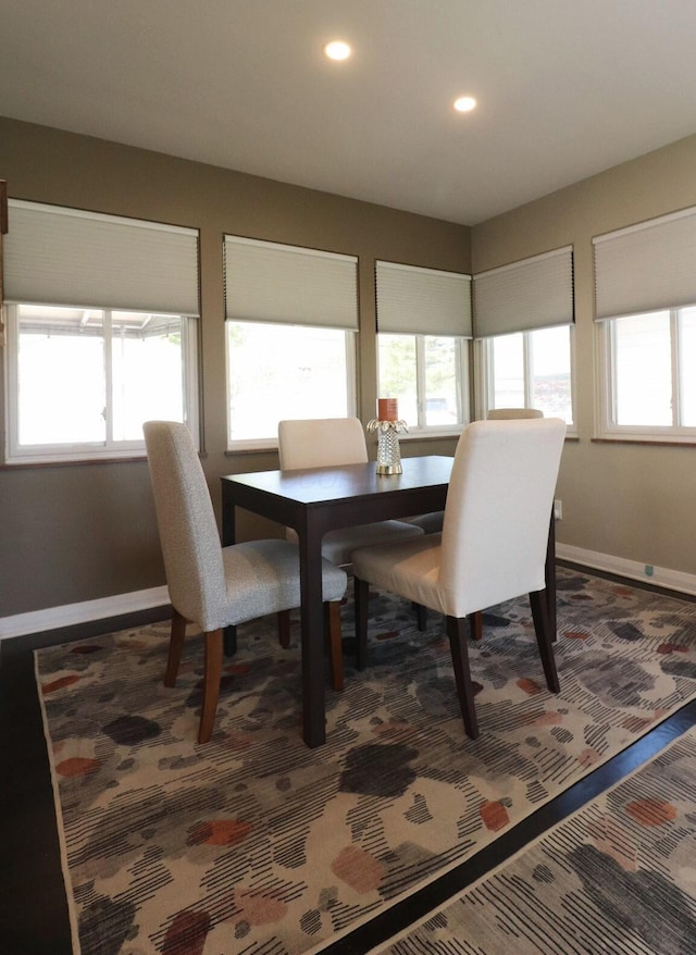 dining room featuring recessed lighting and baseboards