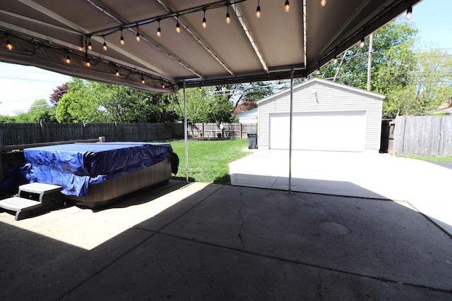 garage with fence and a pool