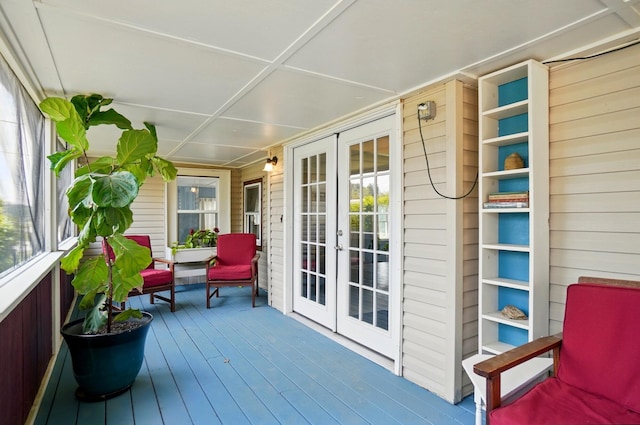 wooden deck featuring french doors and a porch