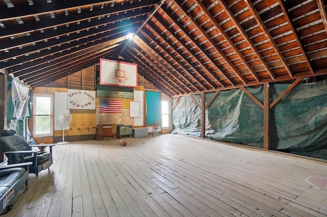 unfinished attic with a healthy amount of sunlight